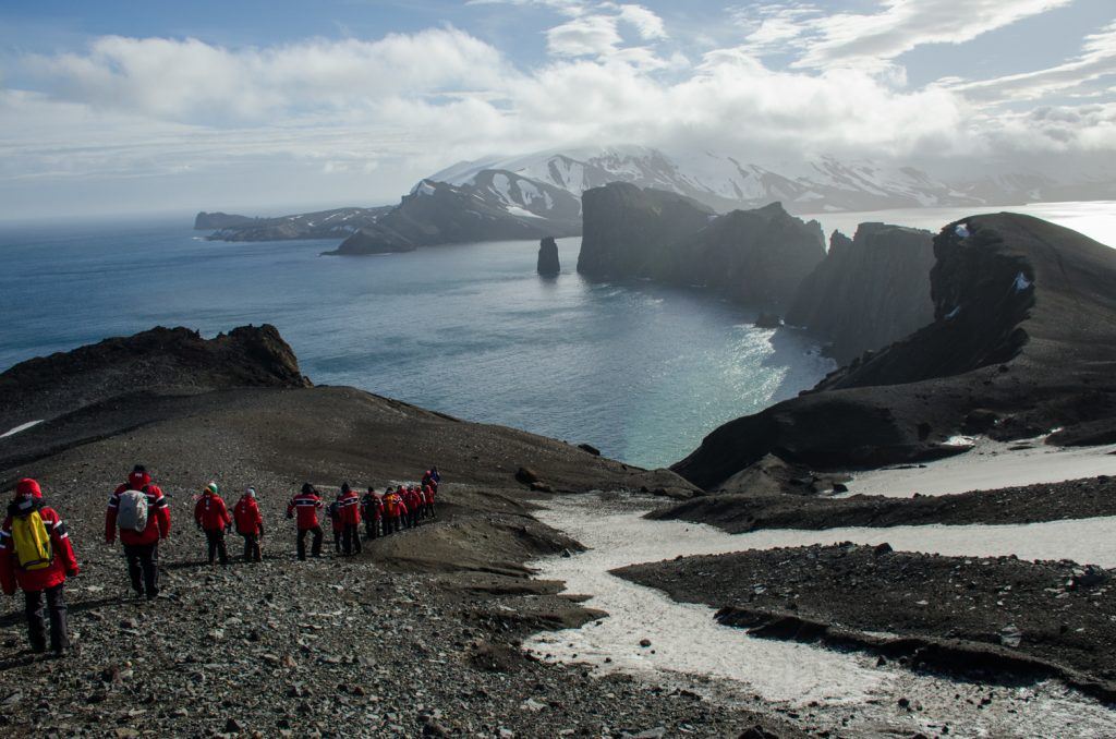 People Hiking Deception Island Counting penguins in Antarctica