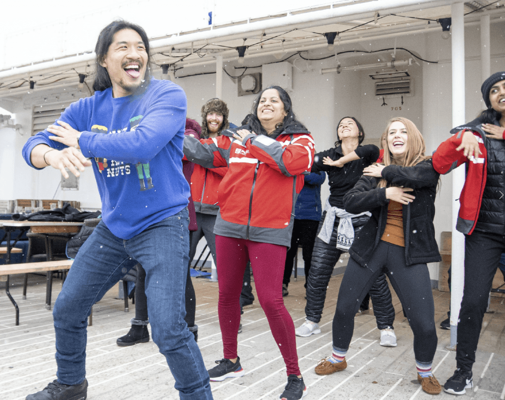 cruise passengers dancing on deck